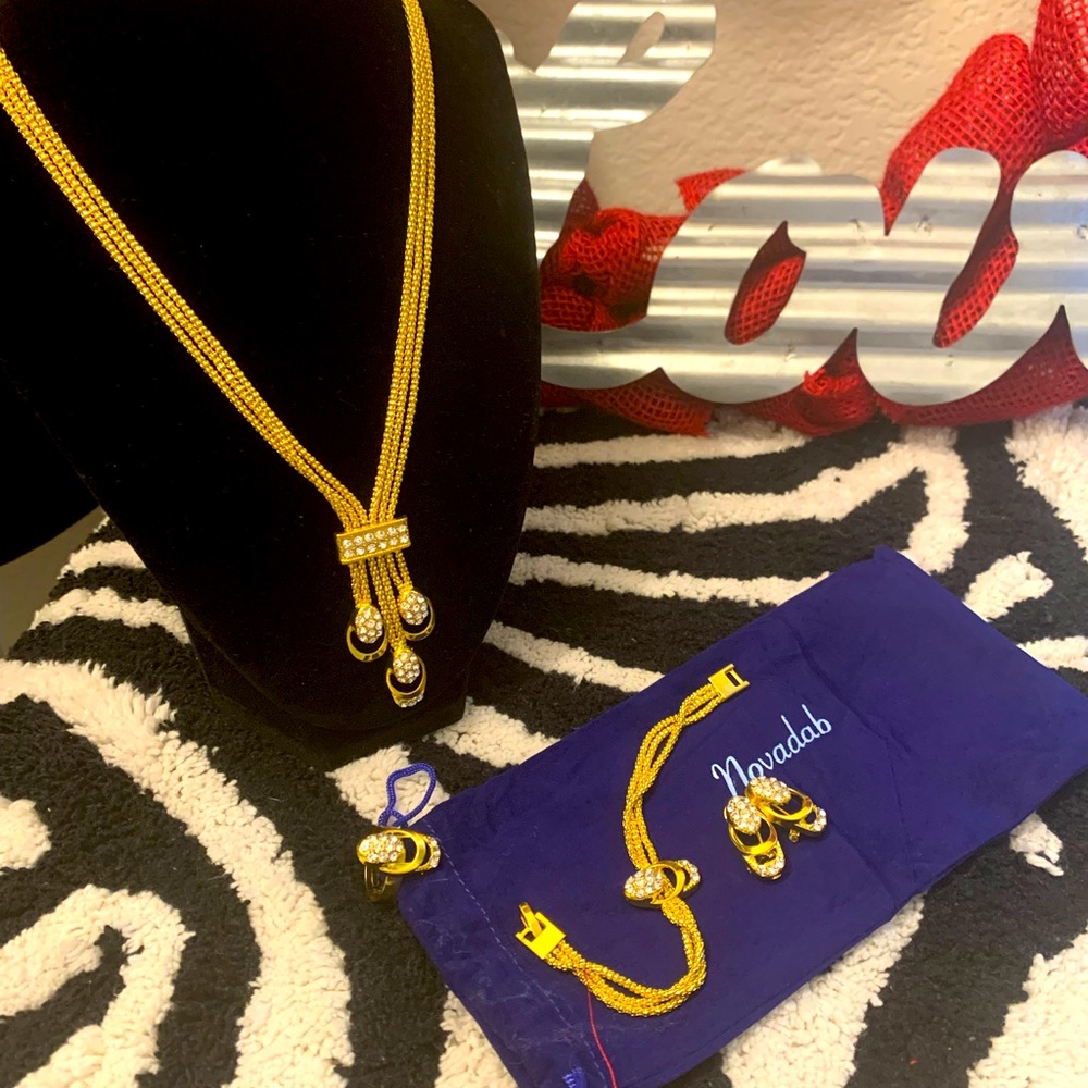 necklace, bracelet, earrings and adjustable ring